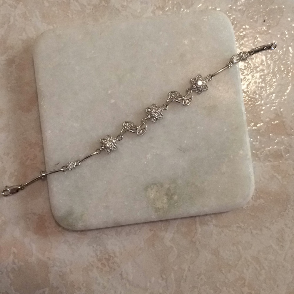White metal/ silver Bracelet with flowers and cz
